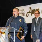 Ross Twp. Police Officer Frank Copobianco Receives Honorable Mention Plaque from KDKA's Rob Pratte