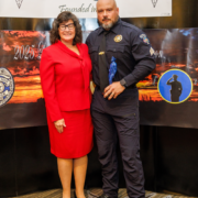 Butler County Commissioner Kim Geyer with Awardee Sergeant Aaron Zaliponi at Amen Corner Law Enforcement Awards
